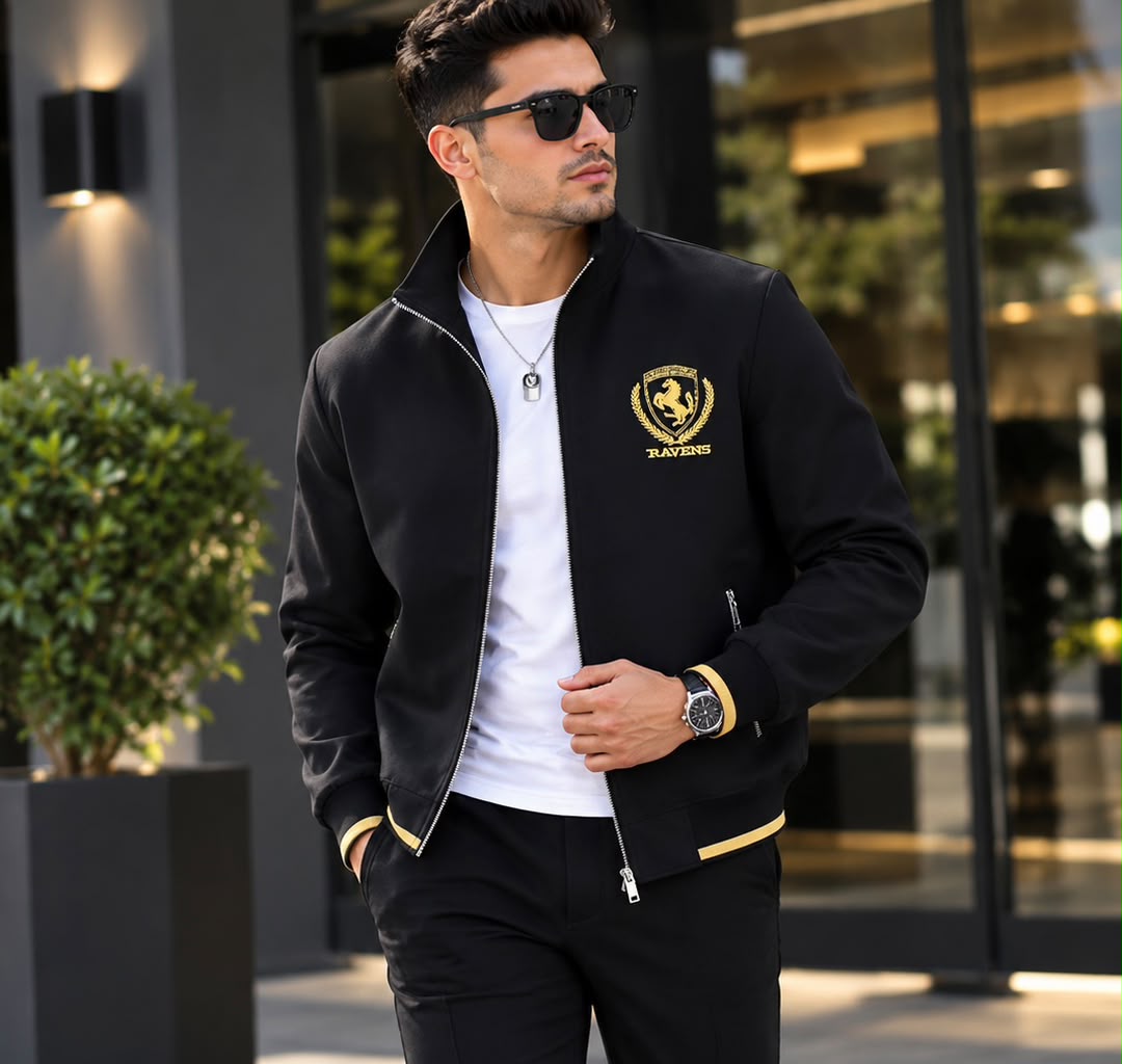 Veste bomber noire pour homme avec col montant, zip et écusson brodé doré